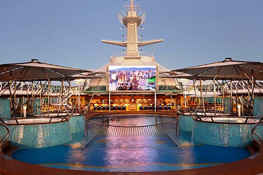 rhapsody-outdoor-movie-screen-pool-deck-sunset-activity.jpg